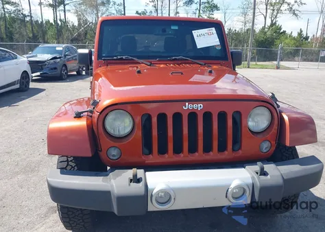 2014 Jeep Wrangler Unlimited Sahara z USA, uszkodzony, nr VIN 1C4BJWEGXEL168913